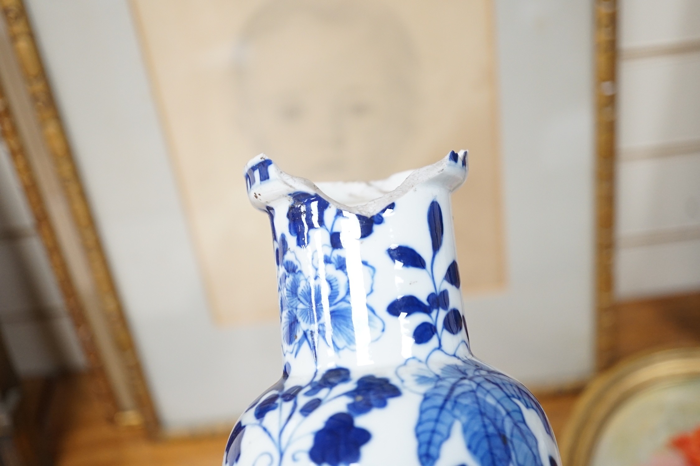 Two Japanese Satsuma boxes and covers, 10cm wide, and a blue and white Chinese vase, 26cms high